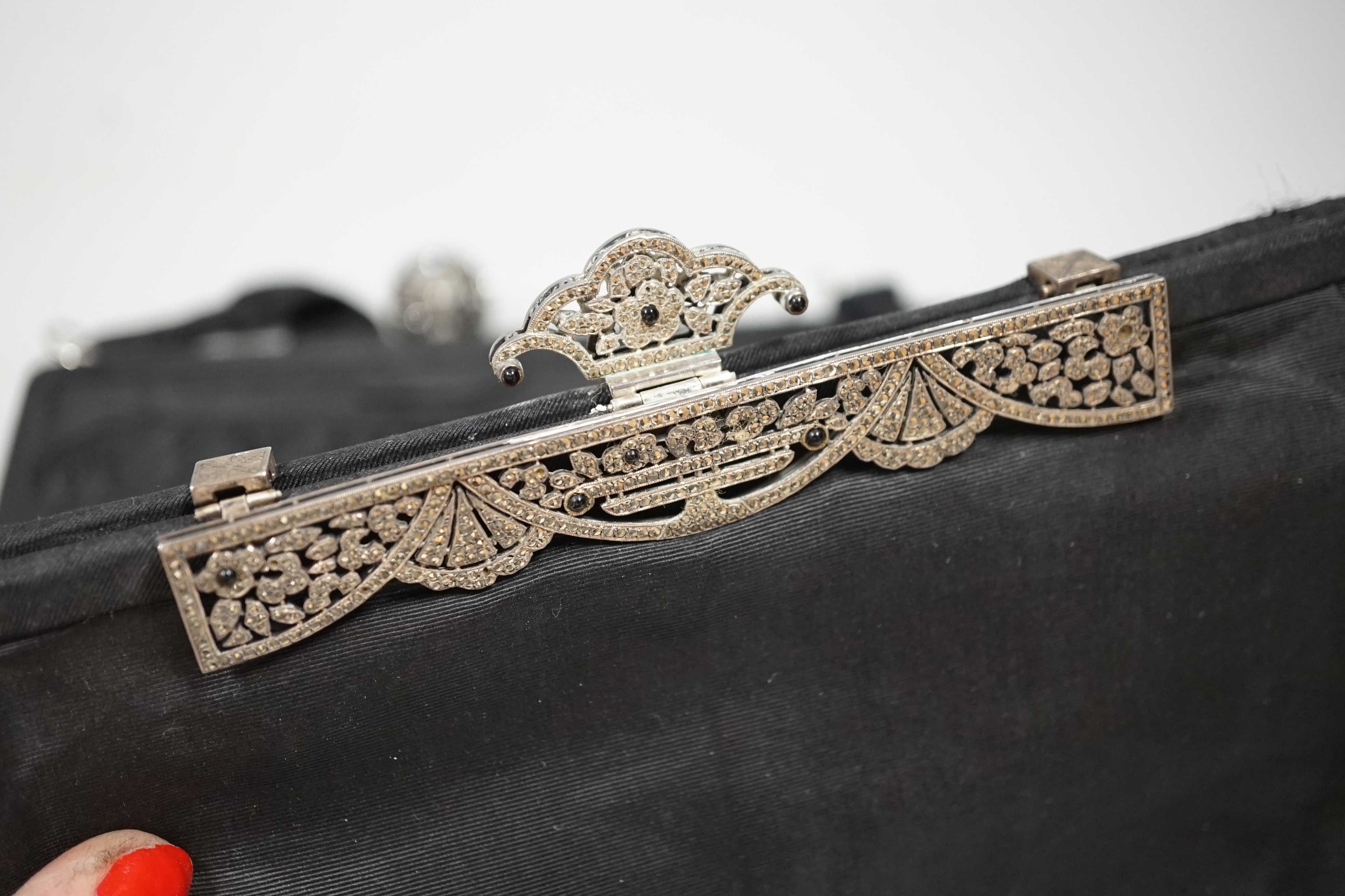 Two 1930’s-40’s evening bags with diamanté encrusted Bakelite frames together with five others with similar diamanté clasps (7)